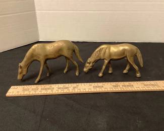 Small brass horses