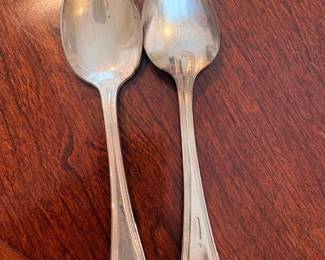 Lots of silver plated flatware. 