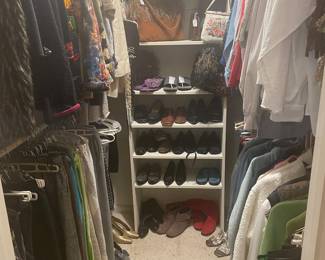 Second closet of designer clothing and wonderful purses