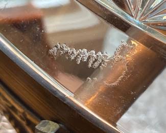 Signature on cut glass lamp