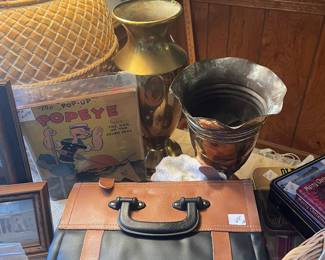 Military trench art vases, 1933 Popeye pop up book and knife cases