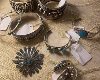Artist signed Southwestern and Mexican sterling cuffs , bangles and pins