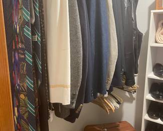 Closet of nice men’s clothing