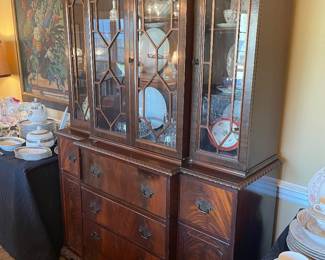 Chippendale crotch mahogany break front 