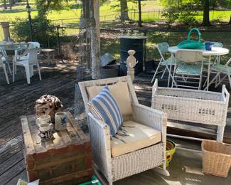 Old wicker rocker and planter