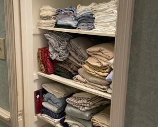 Closet of bed linens ( lots of new and king size)