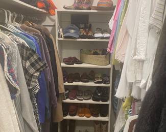 Closet of designer clothing