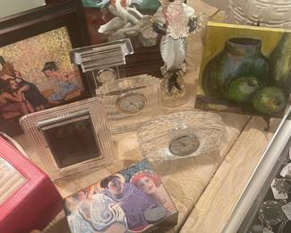 Joanne Staley paintings, Waterford clocks and frame, Barbara Gallagher box and Murano candleholder