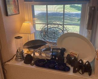 Window seat with old scale and vintage flat irons