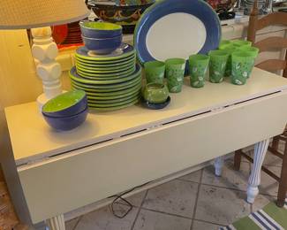 Cream drop leaf table with set of Dansk dinnerware