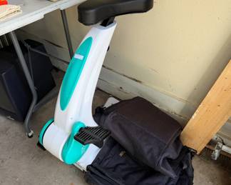 Stationery bike and golf travel bag