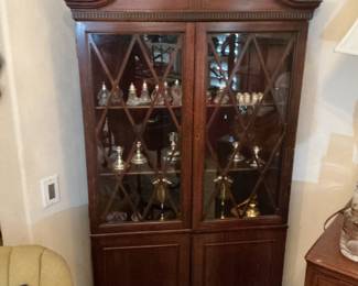 Antique corner curio cabinet