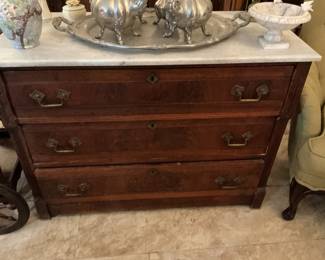 Antique three drawer marble top dresser