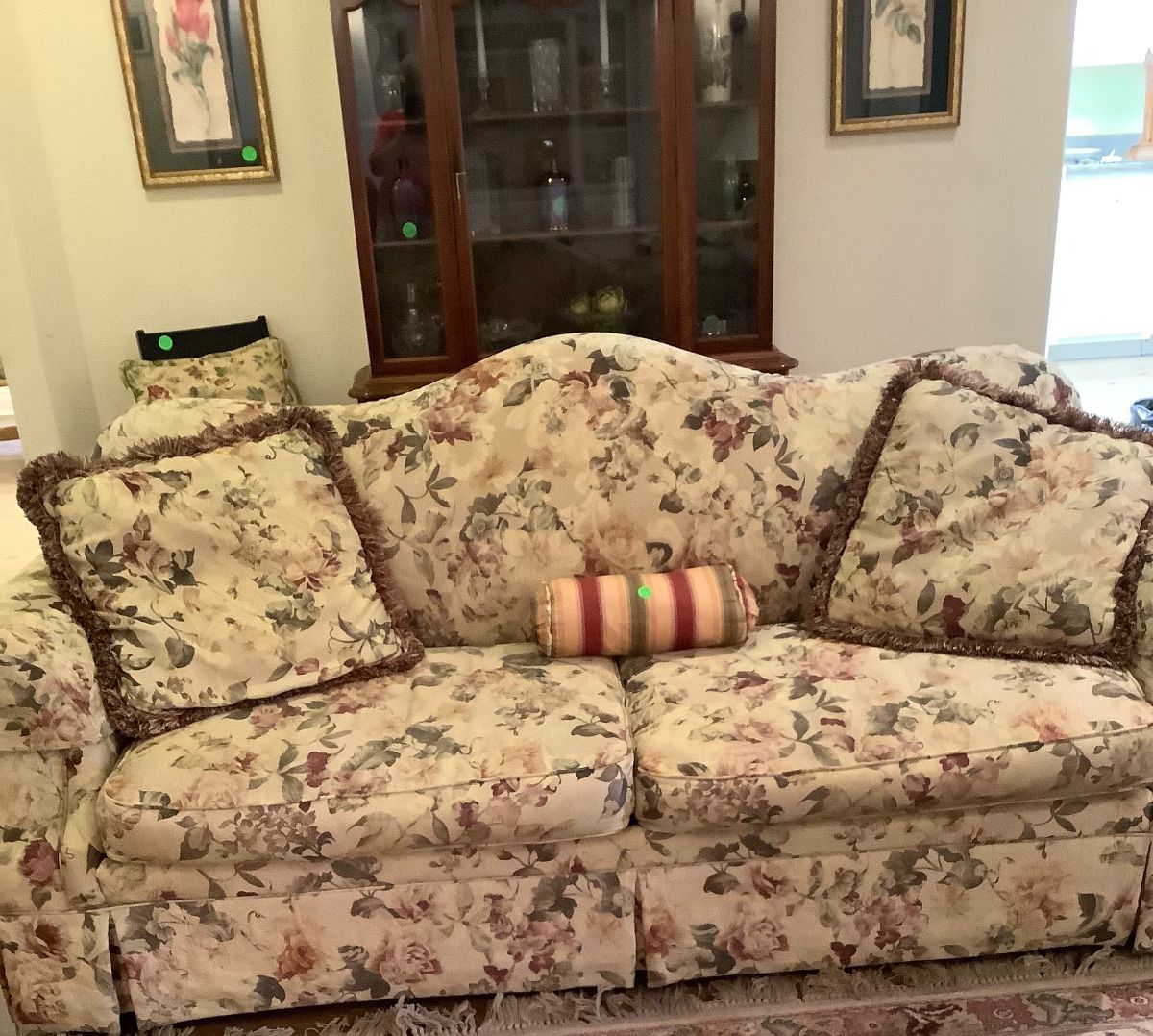 Beautiful beige background Lazy Boy couch, 86”, 2 cushions with green leaves and rose colored flowers. Price: $245,00