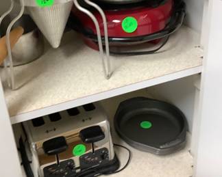 Metal fruit strainer for making jelly or ham.