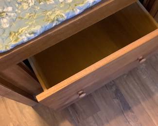 This is one of the six small drawers on side of bed.  Bed is a full bed.  