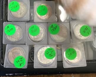 Several silver coins. 