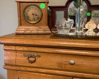 Oak chest is 58” tall, 38” width, 16” depth, has double doors, 2 shelves and 1 drawer and drawer at bottom.  Price: $140.00