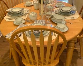 Oval table with 6 chairs.  Also has leaf.  The China sitting on the table js by Noritake, Pattern is Silverkey.  Has 91 pcs.  Price: $850.00