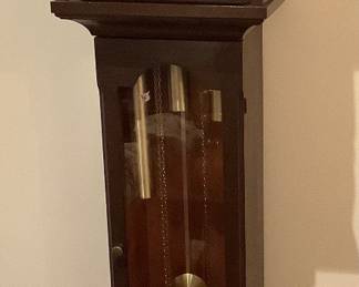 Grandfather clock.  Works, but needs cleaning.  This is just one of the many clocks he c