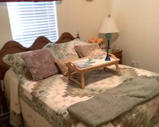 Queen size bed with mattress and box springs.  