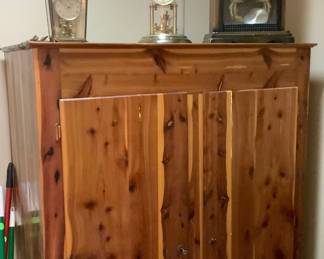 Cedar cabinet js cedar jnsude and out.  It measures 65 1/2” tall, 40” width, 21” depth.  Price: $120.00