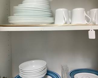 Cornell dinnerware, solid white set, and white with blue ring another set.