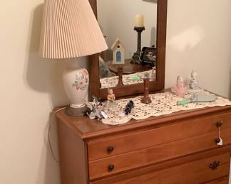 Oak dresser with mirror. It measures: 32” tall, 37” width, 17” depth, mirror measures 40 1/2” tall, 22 1/2” width.  Has 3 drawers.  Price: $120.00.