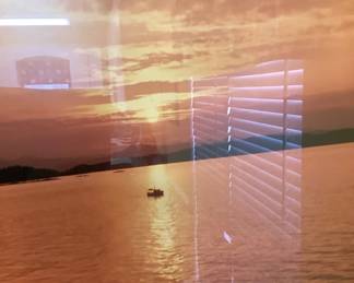 Another one of the art pieces.  Boat on ocean with the sun going down.