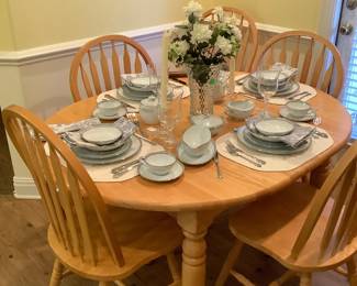 Full view of table. Table measures: 52” long without leaf, 42” wide.  Price:  $165.00.  Has a leaf.