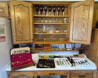 Knives, cookbooks, flatware, crystal, Wustof Dreizach, Wolfgang Puck, Kuhn Rikon.