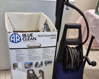 Power washer moved to garage.