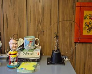 The mechanical golfer is in perfect working order.