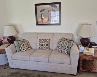 Flexsteel sofa.  There will be a table set up for you to hold items while you shop, please do not set your items on the sofa.