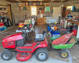 Since I usually come in through the garage...we will start here with my Dad's Toro with its John Deere trailer. It works great and is ready for Spring.