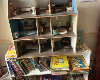 Doll house with furniture and children’s books