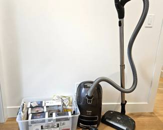 - Miele S8 UniQ canister vacuum cleaner with accessories and supply lot.