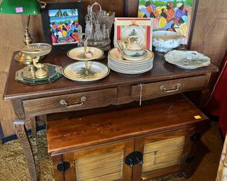 This photo has a variety of decorative dishes, and serving dishes.