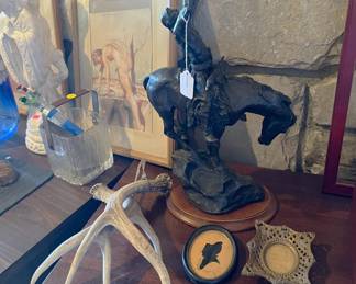 The pair of antlers is shown here, along with the horse and Indian rider statuette.  