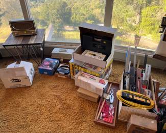 There are calipers here that are useful for transferring a measurement from one place to another, plus a power strip, and more levels, measurement, and related.