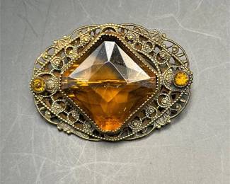 old glass brooch