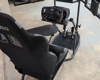 Sim racing rig (chair/pedals/wheel) + 3 monitors