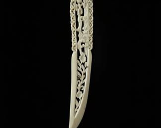 Carved Bone Letter Opener with Figures and Floral Motifs