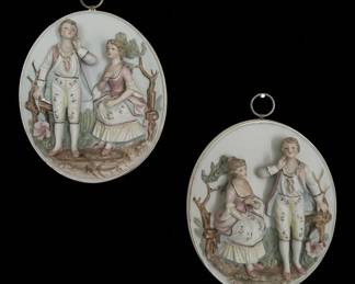 Pair of Porcelain Wall Plaques with Rococo Figures