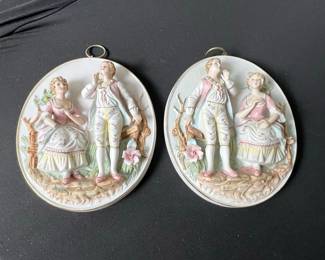 Pair of Arnart Creation Porcelain Wall Plaques with Courting Couple Motif