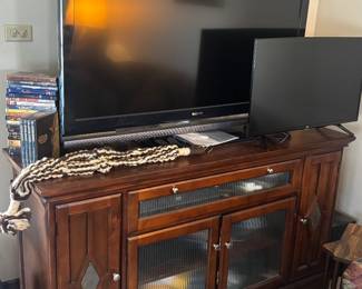 Flat screen tvs, beautiful entertainment stand