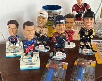Hockey bobble heads, pez dispensers 