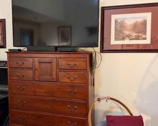 Flat screen TV, Longaberger basket, Beautiful dresser