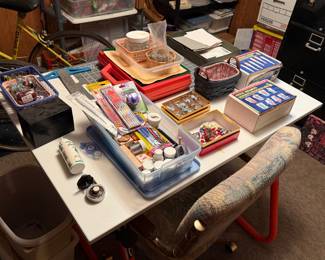 Art supplies, desk, paints