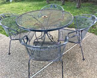 Wrought iron patio table with 4 chairs